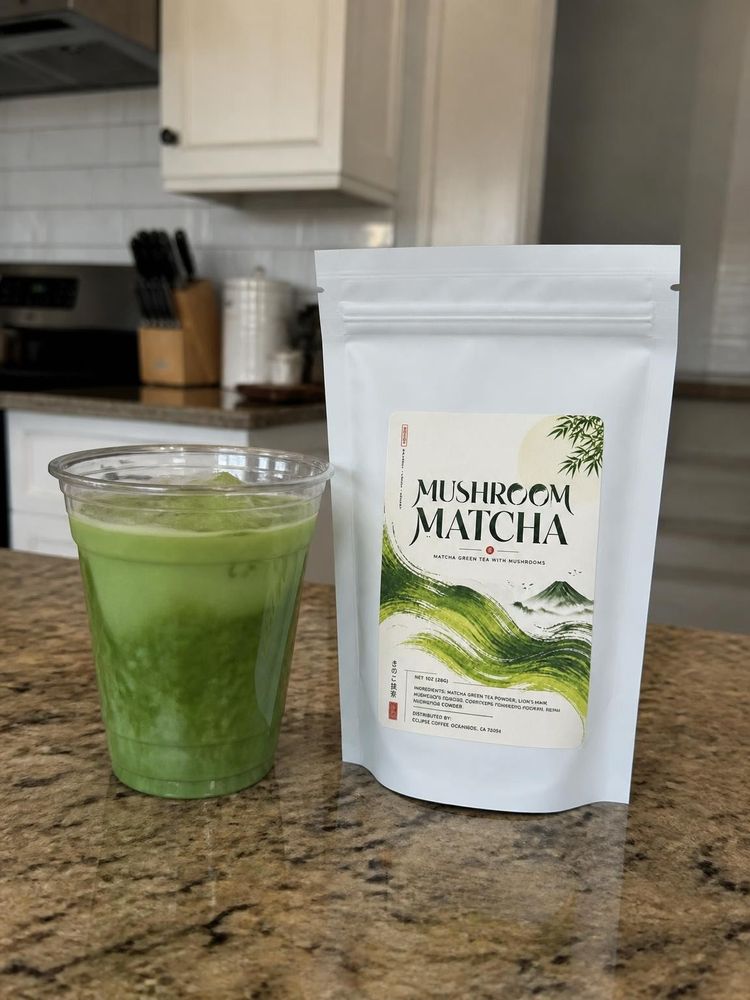 Glass of iced mushroom matcha tea prepared at home